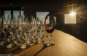Red wine pouring into glass